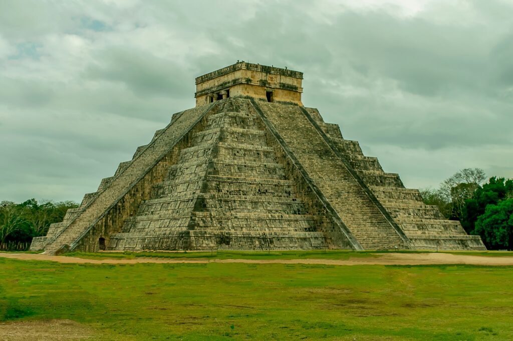 Beautiful shot of Chichen Itza in Mexico under a cloudy sky