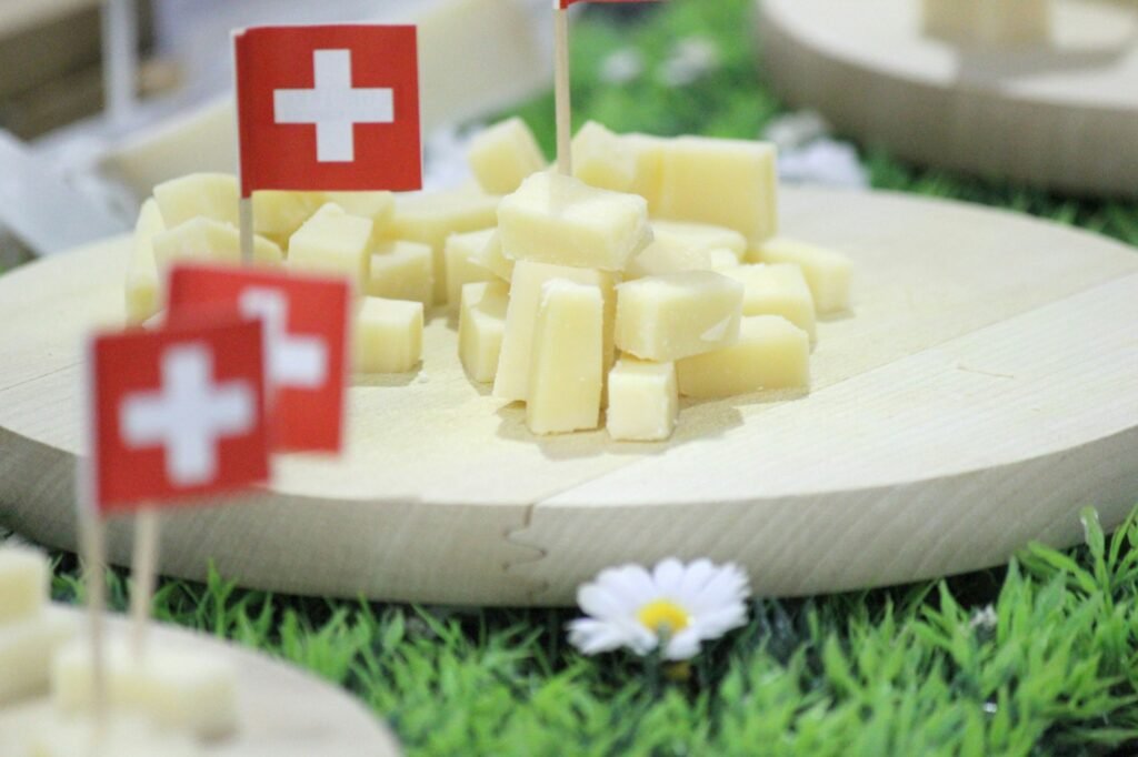 Samples of Swiss cheese on a cheese board for tasting