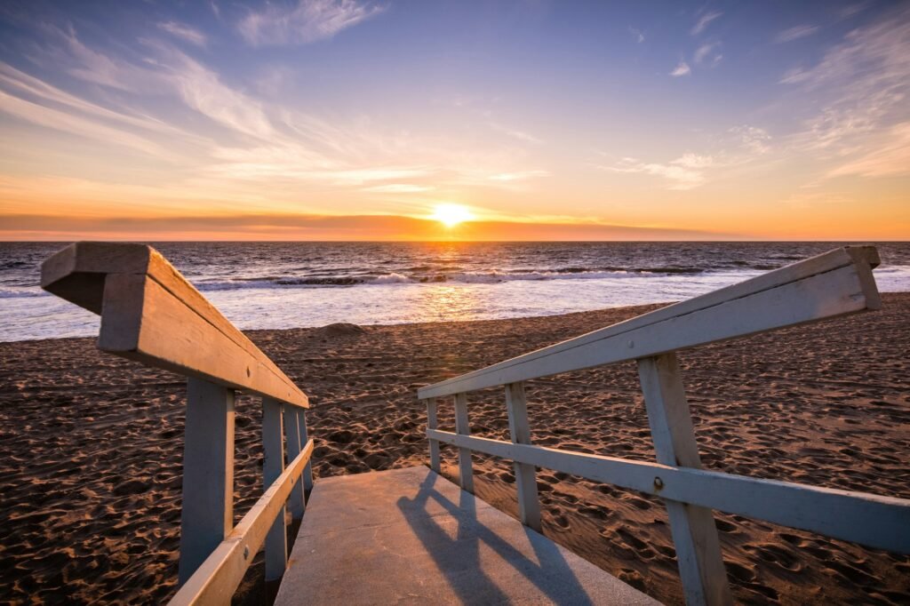 Sunset on one of Malibu's sandy beaches, the Pacific Ocean coastline, Los Angeles county, California